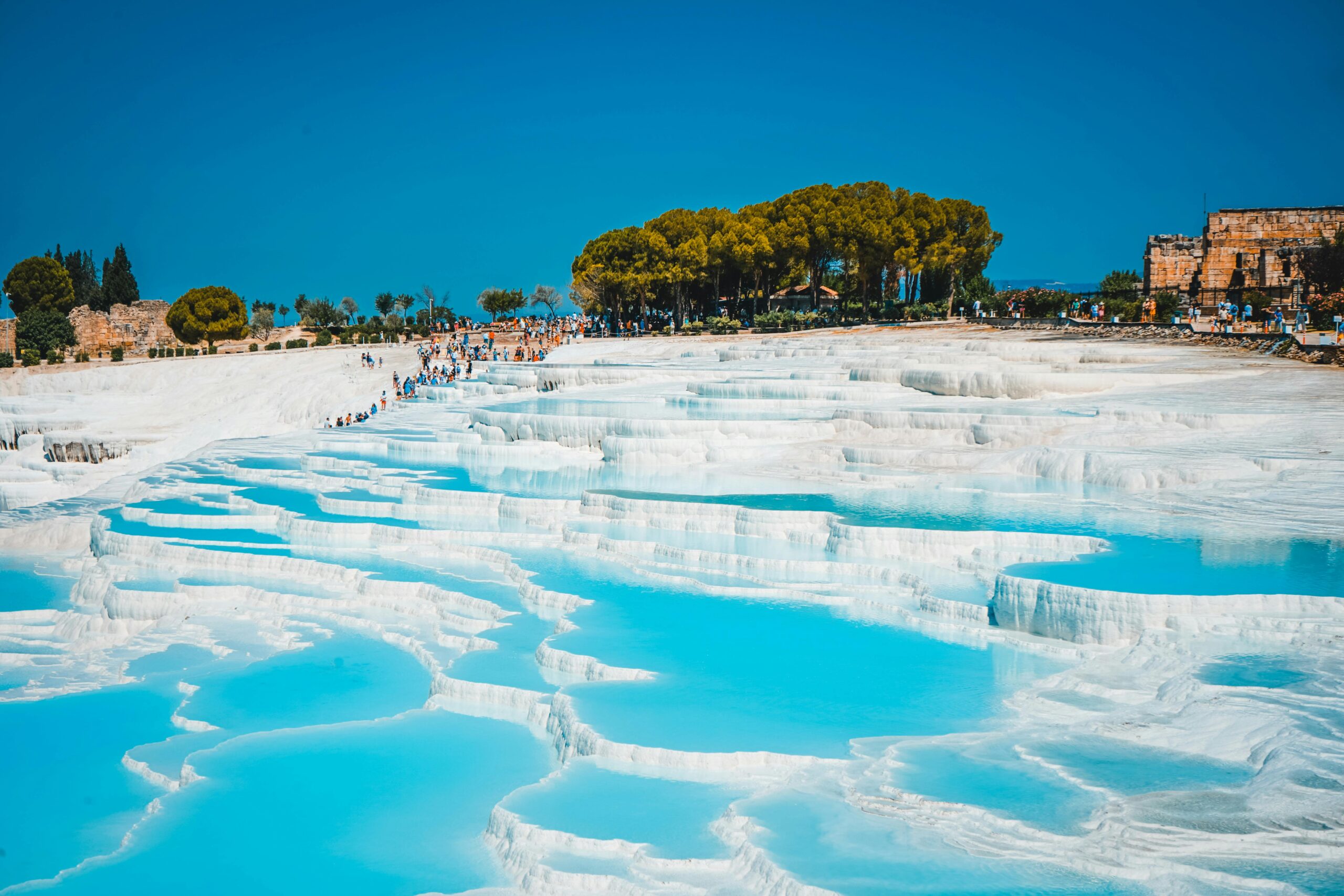 White travertine terraces and blue pools of Pamukkale | Conmigo Travel Agency
